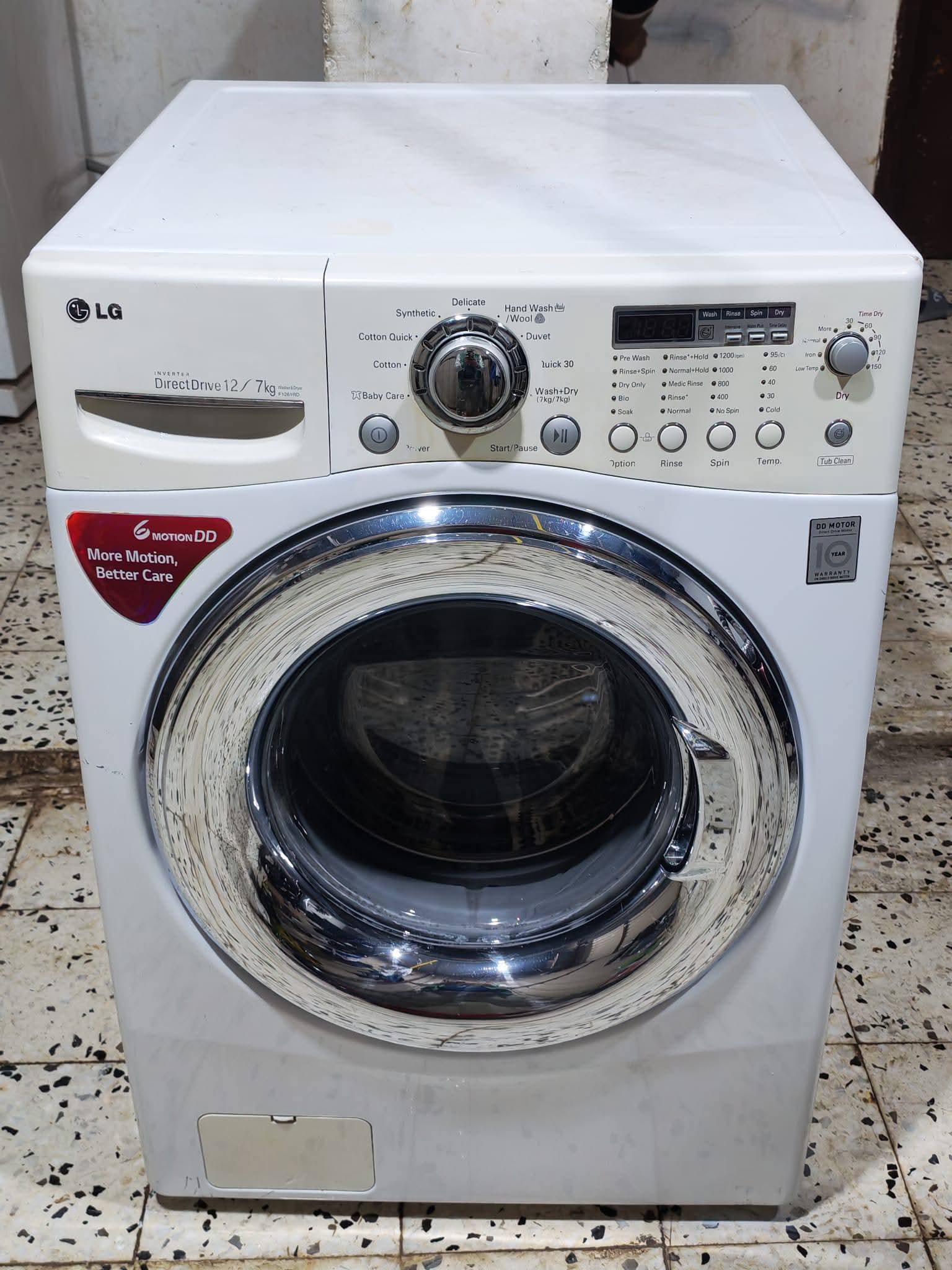 للبيع غساله ال جي 12 كيلو تنشيف كامل تعمل بامتياز
