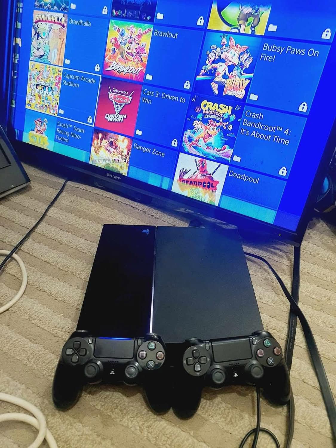 بلايستيشن 4 فات مهكر عليه 65لعبه